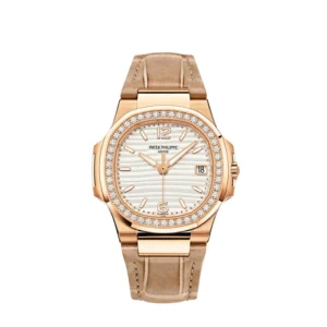 A gold watch with diamonds on the bezel.