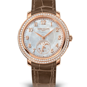 A watch with brown leather strap and white face.