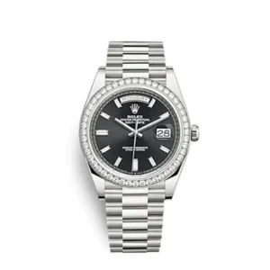 A silver watch with a black face and diamond bezel.