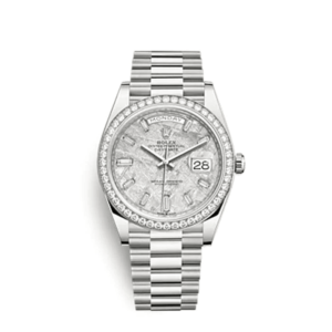 A silver watch with diamonds on the side of it.