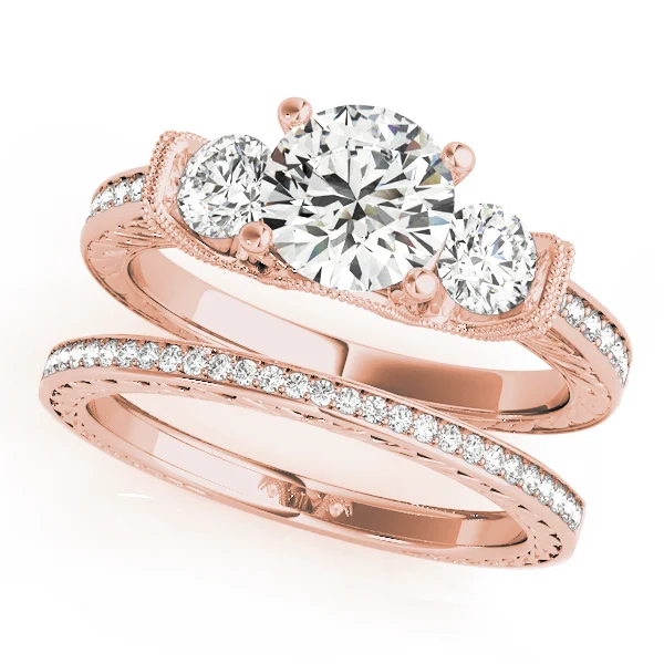 ENGAGEMENT RINGS 3 STONE ROUND - Image 9