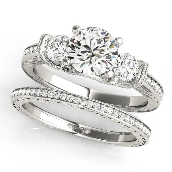 ENGAGEMENT RINGS 3 STONE ROUND - Image 3