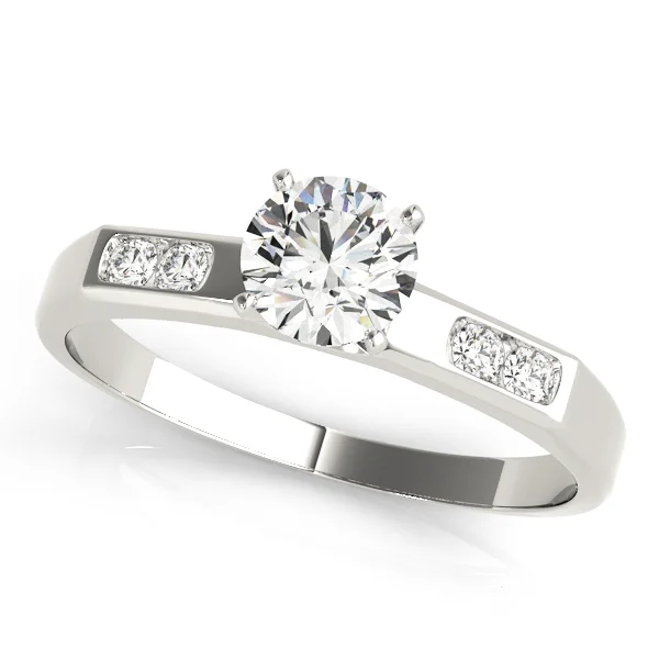 Single Row Channel Set Peg Head Engagement Ring
