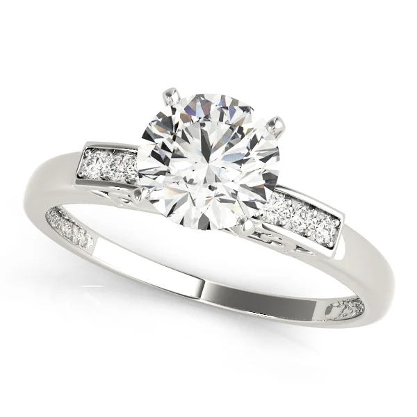 Single Row Peg Head Engagement Ring