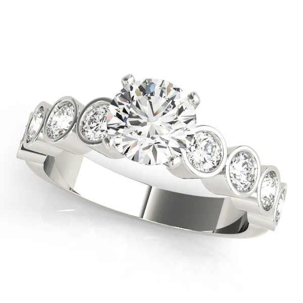 ENGAGEMENT RINGS SINGLE ROW BEZEL