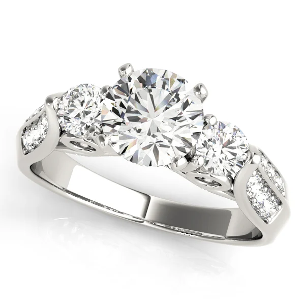 ENGAGEMENT RINGS 3 STONE ROUND