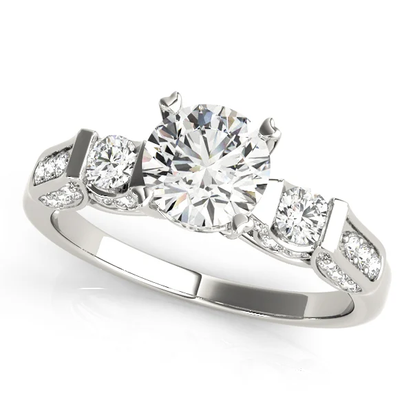 ENGAGEMENT RINGS 3 STONE ROUND